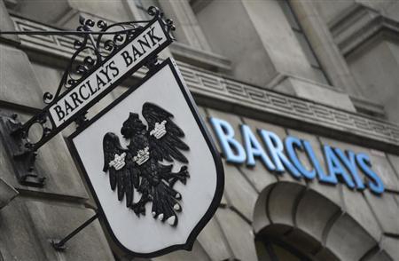 Logos are seen outside a branch of Barclays bank in London July 30, 2013. REUTERS/Toby Melville