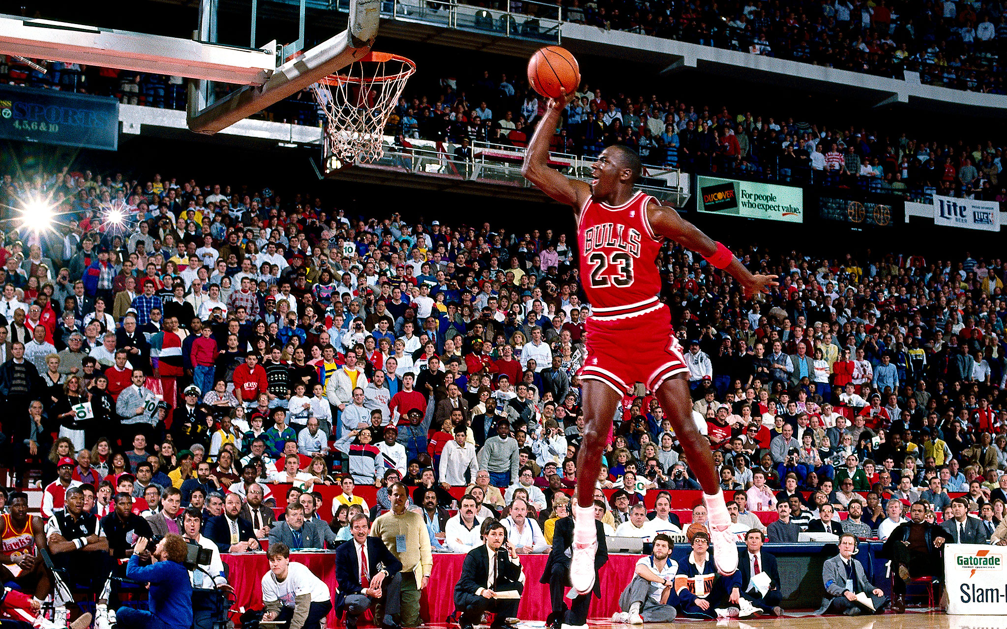 7 Feb 1988: Michael Jordan #23 of the Chicago Bulls goes for a dunk during the 1988 NBA All Star Slam Dunk Competition at Chicago Stadium in Chicago, Il. Jordan went on to win the Slam Dunk Competition.  HIGH RESOLUTION FILE 42 MB. NOTE TO USER: User expressly acknowledges and agrees that, by downloading and/or using this Photograph, User is consenting to the terms and conditions of the Getty Images License Agreement. Mandatory copyright notice and Credit: Copyright 2001 NBAE  Mandatory Credit: Andrew D. Bernstein/NBAE/Getty Images